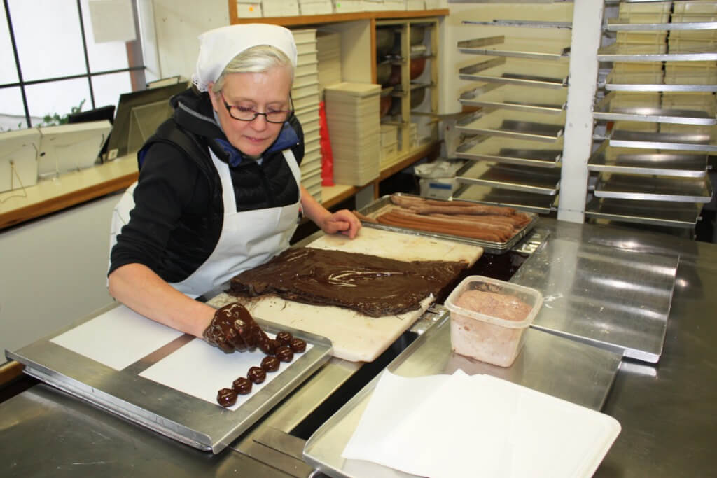 Boehm's Candies lady making chocolate